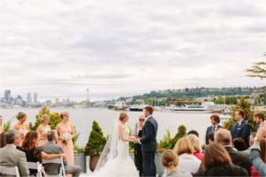 a couple getting married on the MV skansonia wedding venue in seattle