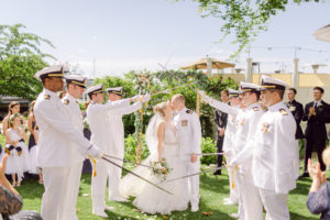 a bride and groom kissing at the alter at their roche harbor wedding