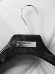 a suit hanger that has tom ford engraved in it