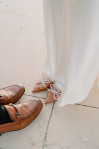 a bride and grooms shoes for their elopement in paris