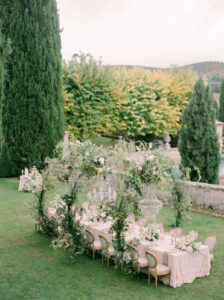 a view of an elegant wedding reception table from abover at villa cetinale in tuscany
