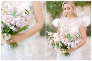 a bride holding her wedding bouquet and looking down at the flowers