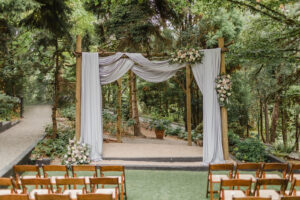 a wedding ceremony set up on a lawn at JM Cellars in Woodiville Washington