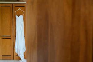 a wedding dress hanging up