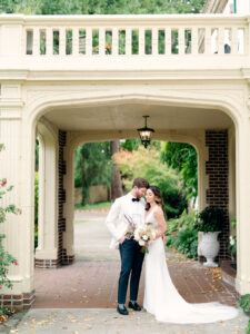 a bride and groom standing together at their wedding at lairmont manor