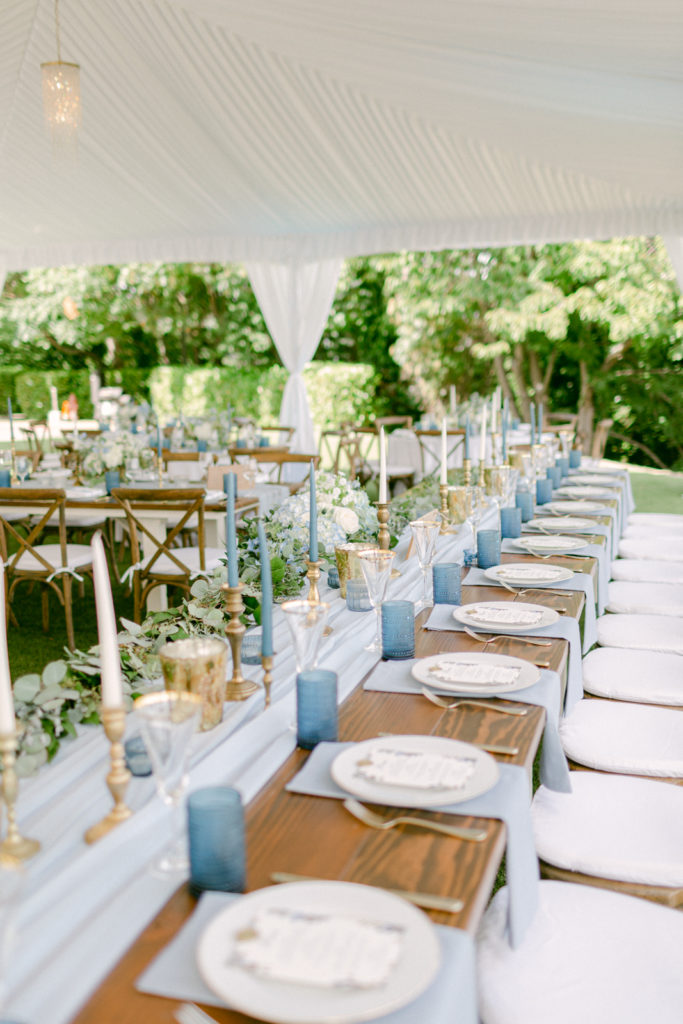 backyard wedding decor with elegant blue and white details