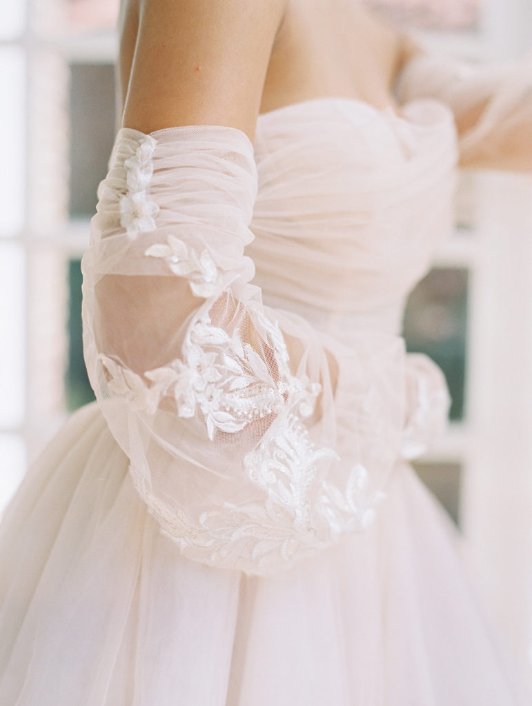 pink wedding dress lace detailing on sleeve
